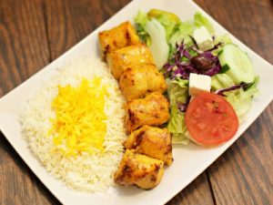Salad, basmati rice, chicken dish