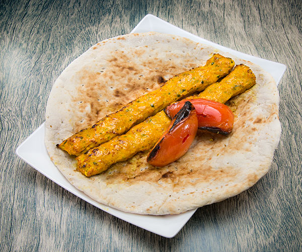 Spicy chicken paired with some pita bread